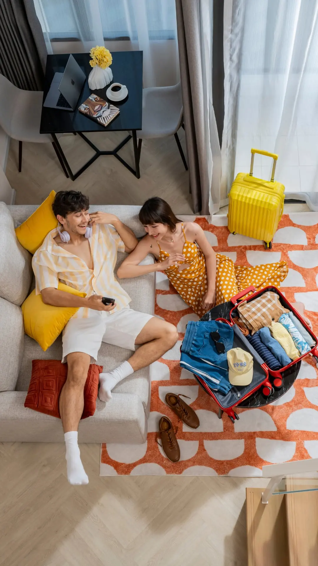 Couple in colourful hotel room